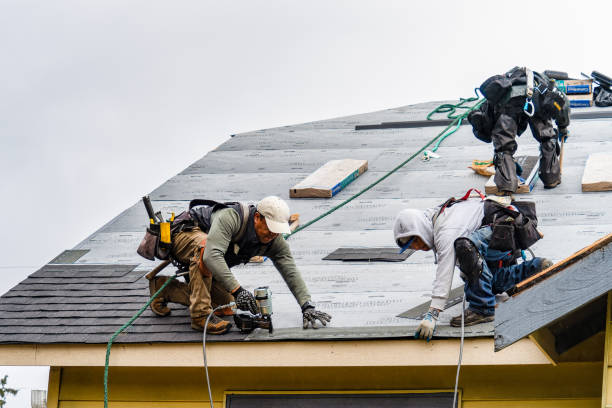 Professional Roofing technician working in New Salem, MA